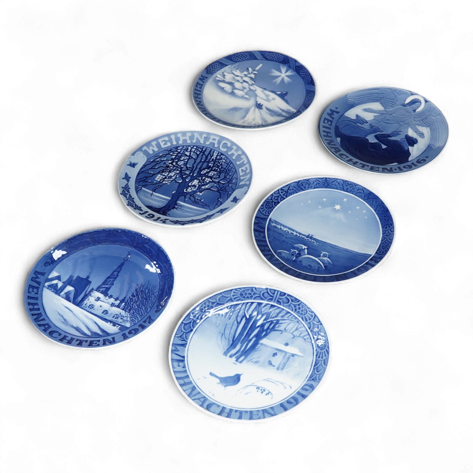 A set of six early Royal Copenhagen Christmas plates, 1914-1919, 18cm in diameter